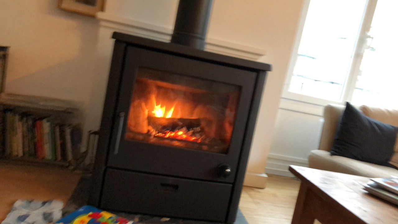 Poêle à bois dans un salon, Espace de Feu